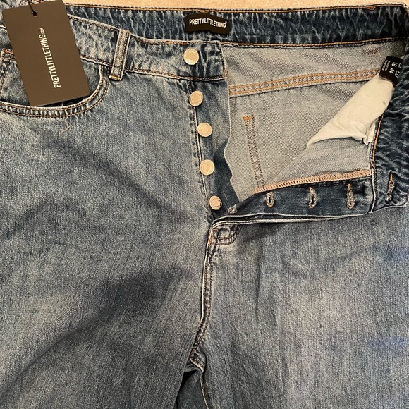 Size 12 Pretty Little Thing Mid Blue Wash Extreme Ripped Hem Boyfriend Jeans - Picture 6 of 9